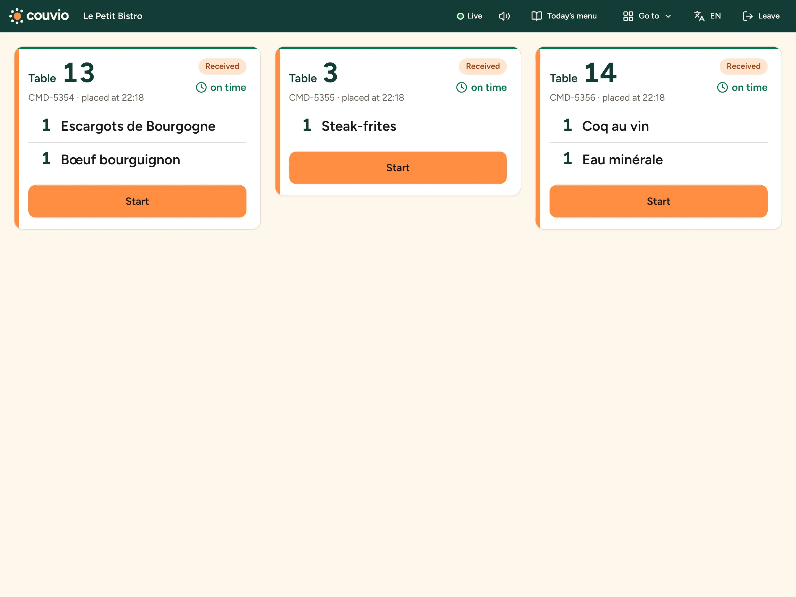 Kitchen screen on a tablet: three orders in progress
